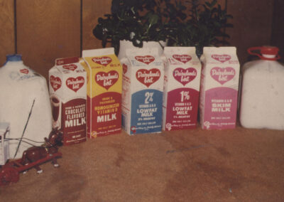 milk farm near me, alcohol gift baskets, aged cheese, flavored milk, milk delivery near me, mild cheddar cheese,
